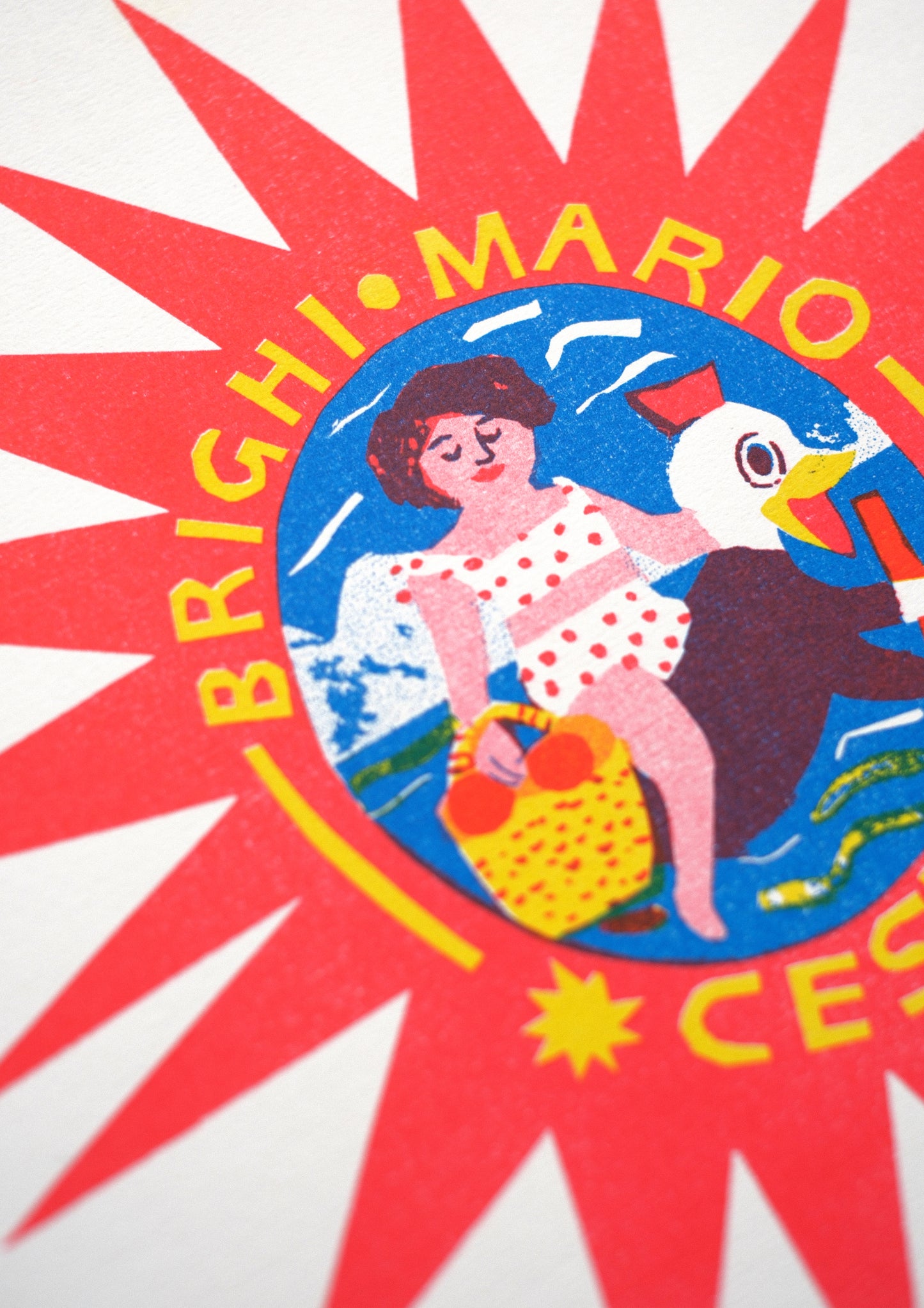 A vibrant graphic featuring a central circular emblem with a woman in a polka dot swimsuit, holding a beach ball. Surrounding the emblem are bold red rays, with the text "Brighi Mario Cesena" prominently displayed.