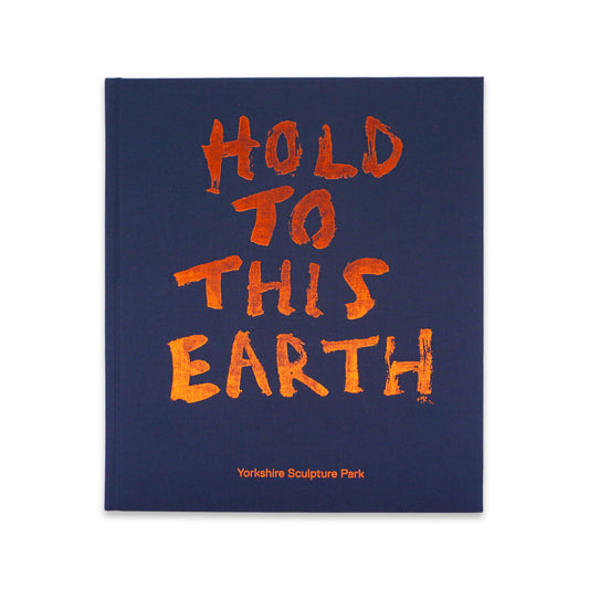 A rectangular book cover with a dark navy blue background and large orange text reading “HOLD TO THIS EARTH.” Smaller orange text at the bottom reads “Yorkshire Sculpture Park.