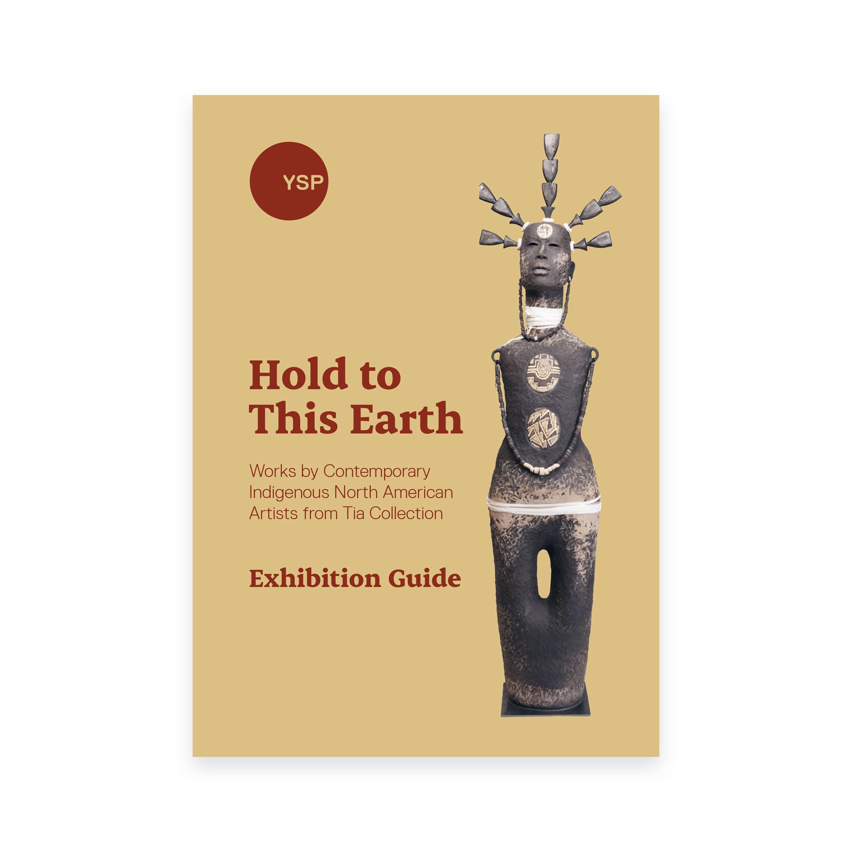 Exhibition guide cover titled "Hold to This Earth" featuring a sculpture of a stylised human figure with geometric patterns. The background is beige, and the text highlights works by contemporary Indigenous North American artists from the Tia Collection.