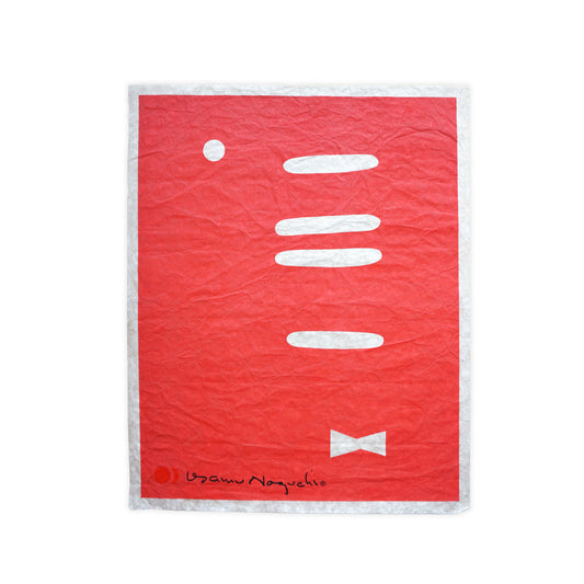 Red washi paper with white abstract design on a white background