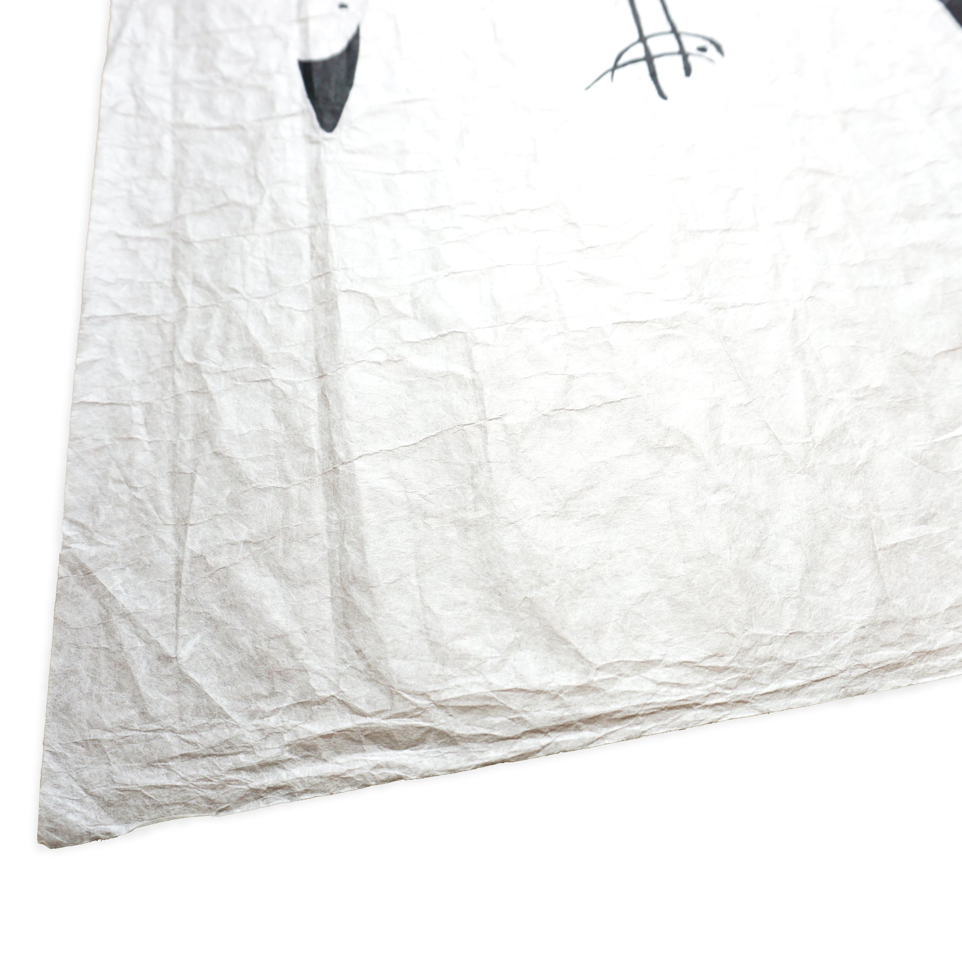 White washi paper with black text and design on a white background