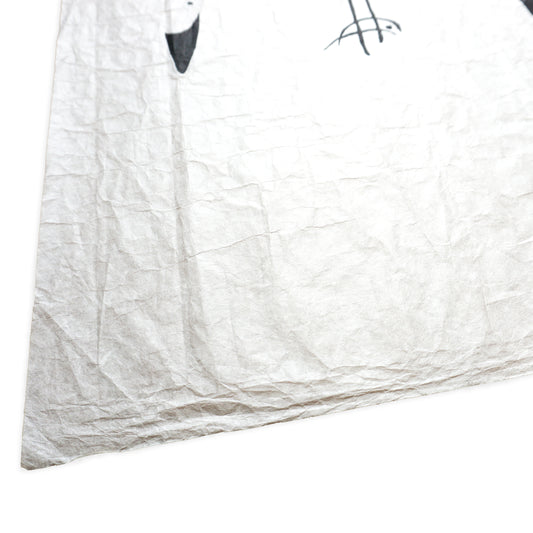 White washi paper with black text and design on a white background
