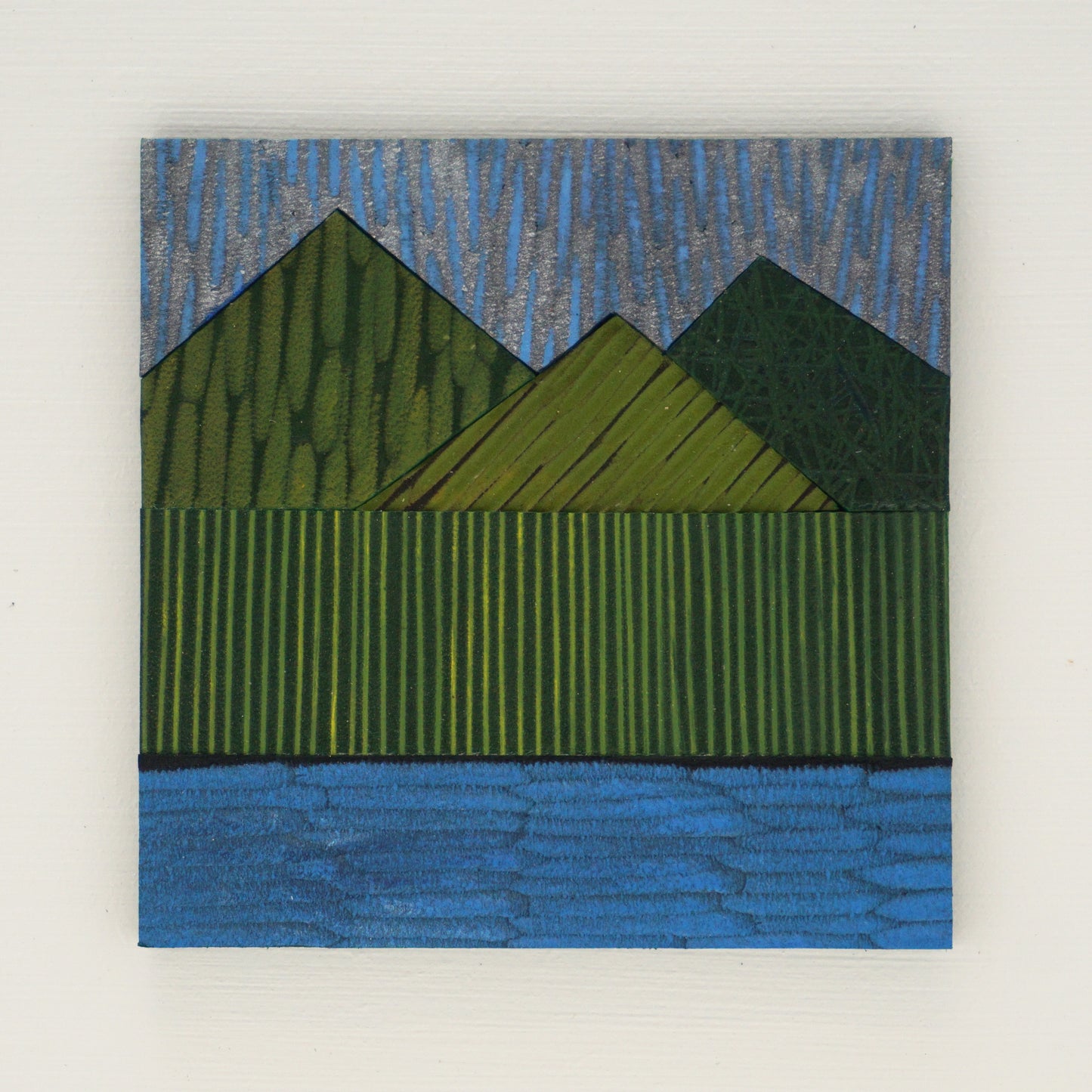Textured artwork of green mountains and water with a blue sky.