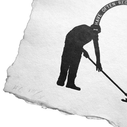 Silhouette of a person with a shovel on a textured white background. The pencil edition number is visible in the bottom corner.