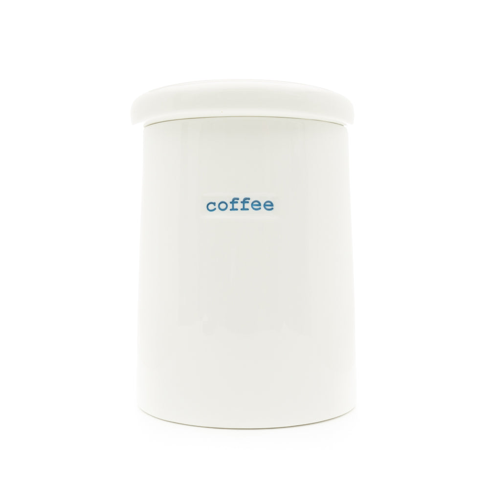 A white porcelain storage jar with the word 'coffee' written on it in blue, having a lid.