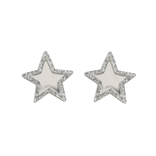 A pair of acrylic star shaped studs with a silver middle and a silver glitter edge.