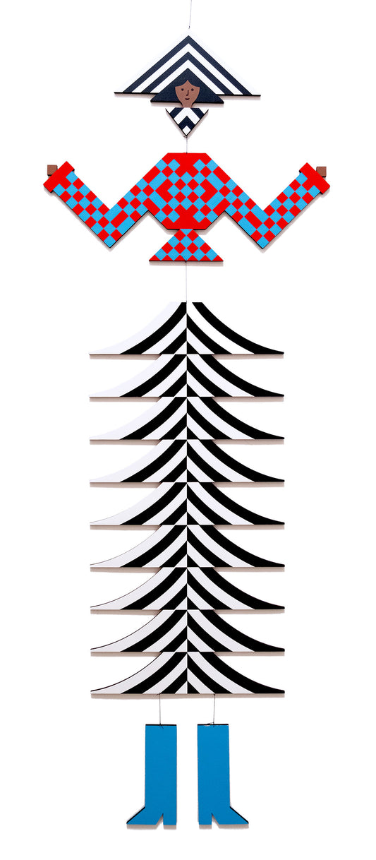 A hanging wooden colourful mobile featuring a full figure with a headdress and boots covered in bright geometric patterns.