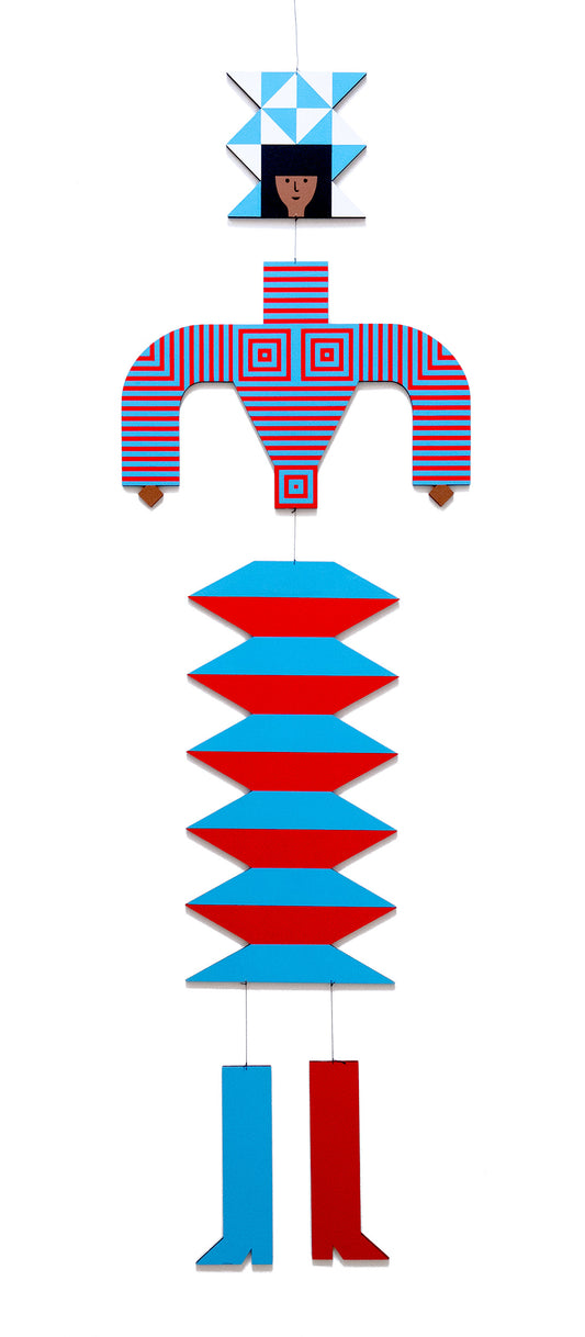 A hanging wooden colourful mobile featuring a full figure with a headdress and boots covered in bright geometric patterns.