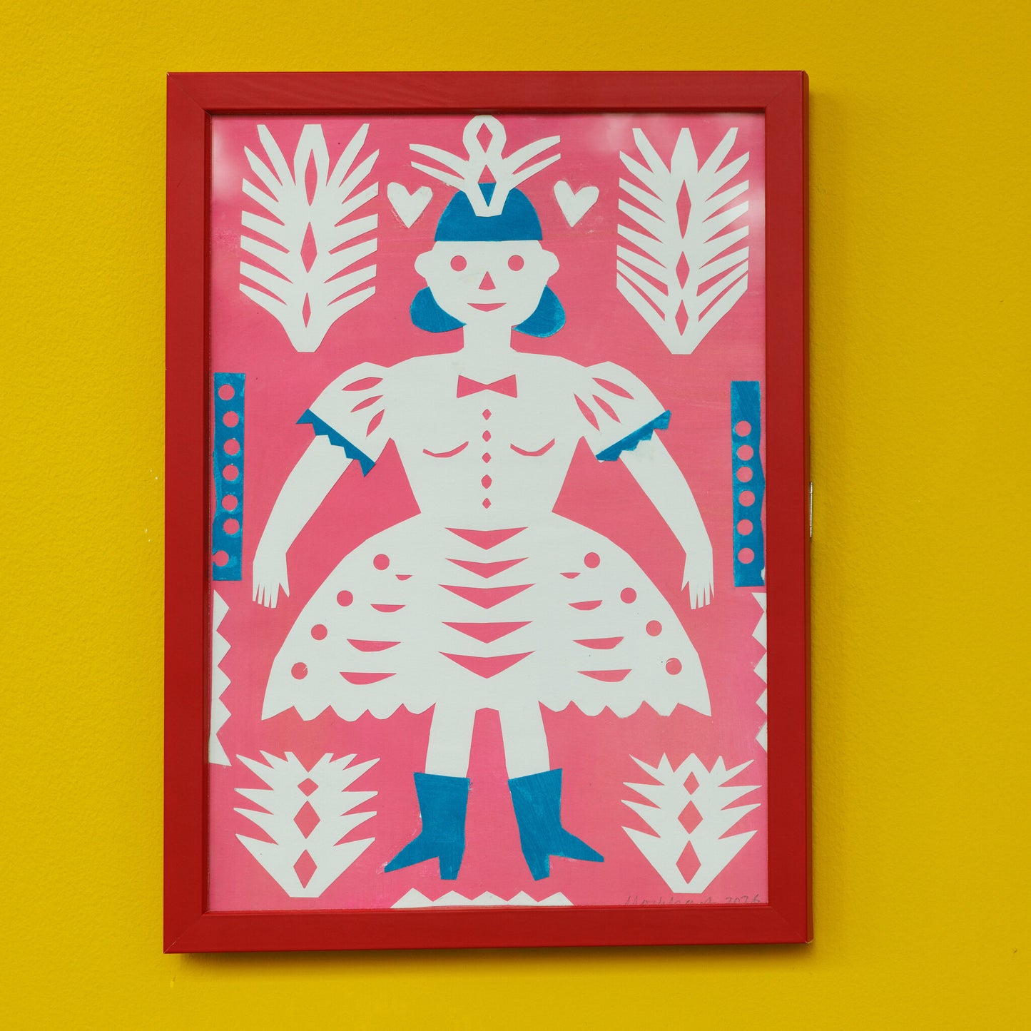 A vibrant artwork featuring a stylised figure with a crown, wearing a white dress adorned with cut-out patterns. The background is pink, and the figure is surrounded by blue and white decorative elements, all framed in a bold red frame.