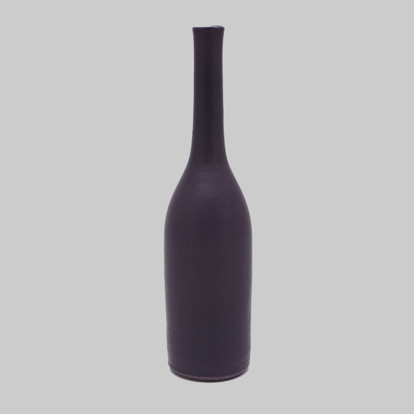 Damson bottle-shaped vase on a white background