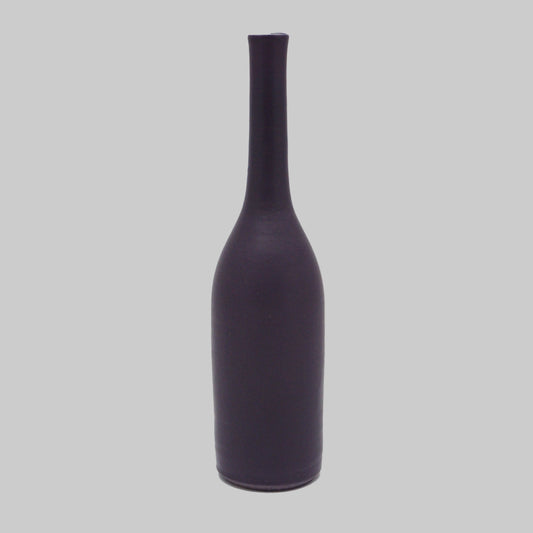 Damson bottle-shaped vase on a white background