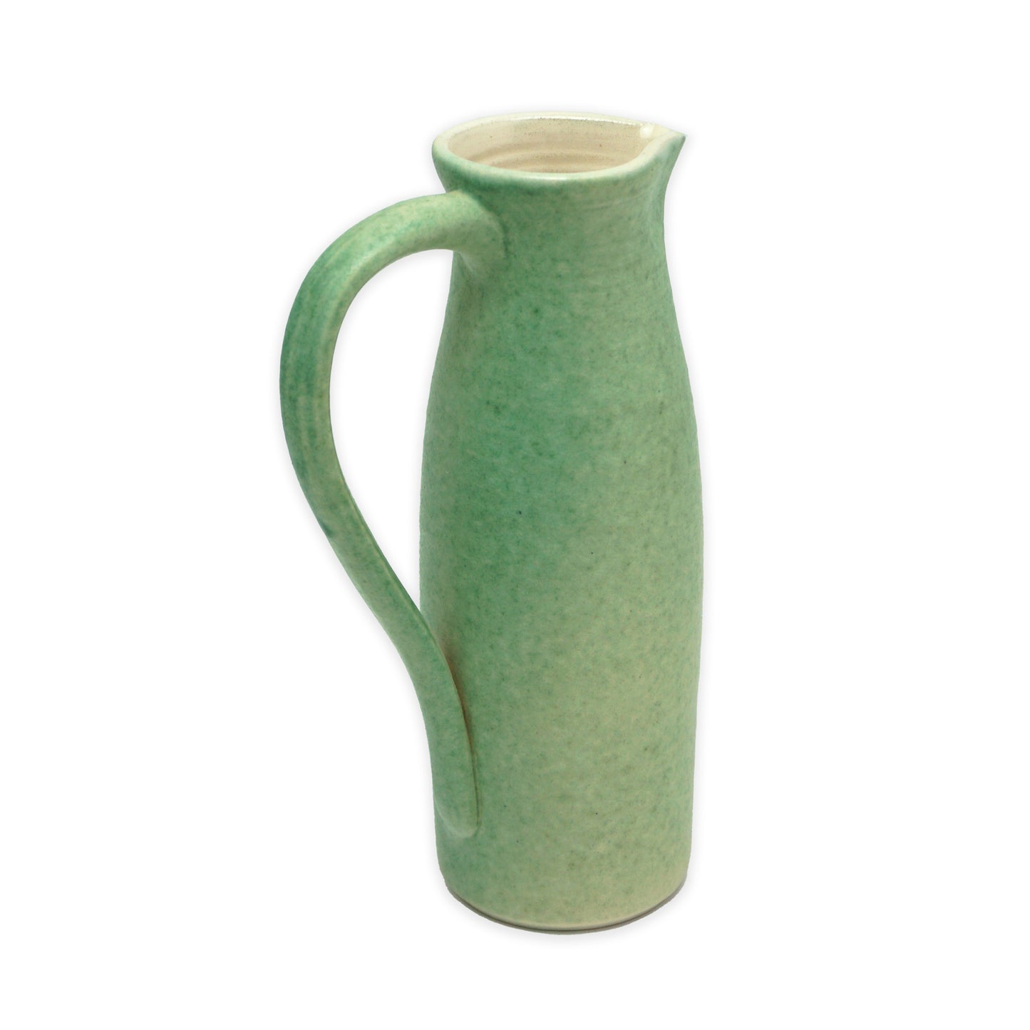 Green ceramic pitcher on a white background