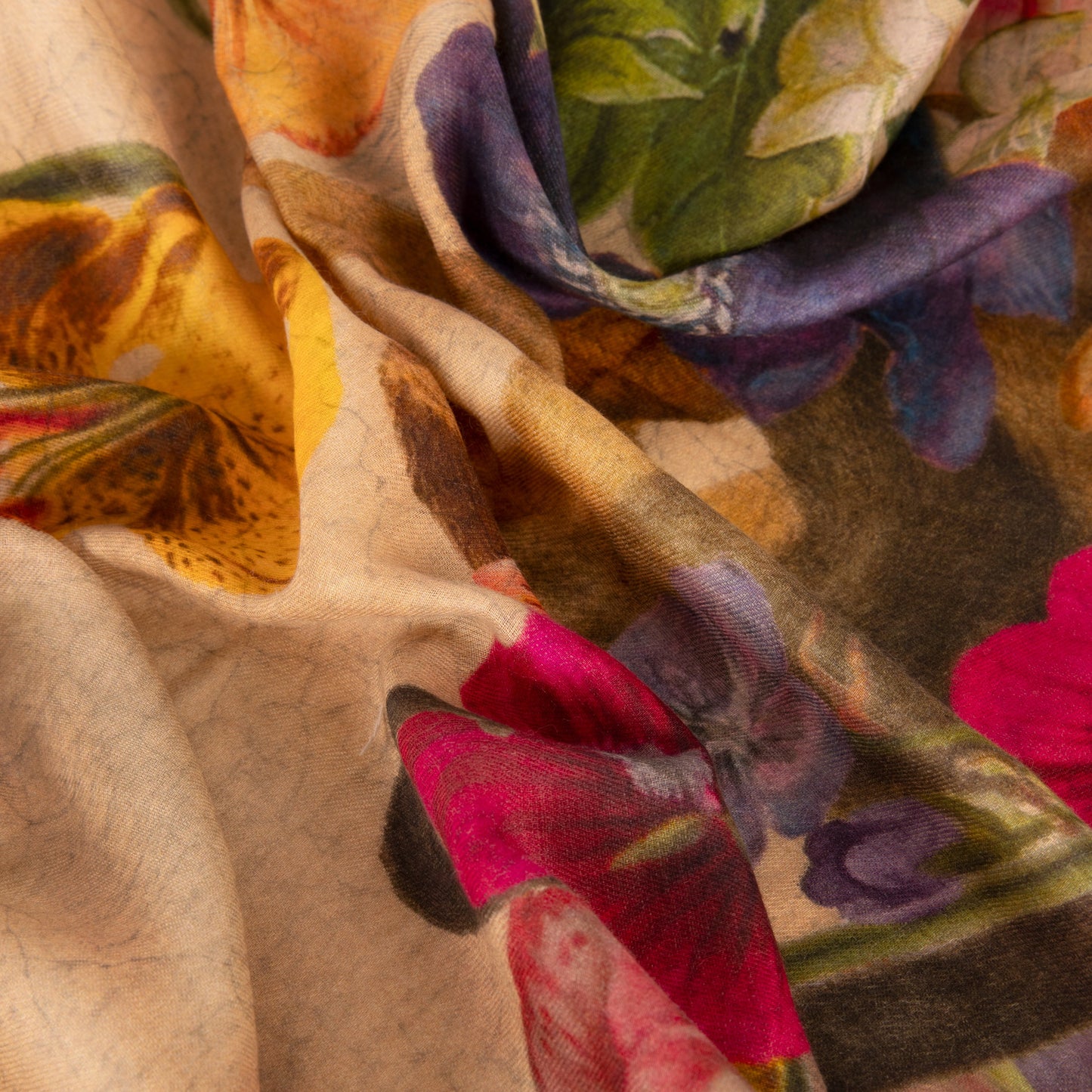 Close-up of a colorful floral fabric with various flowers.