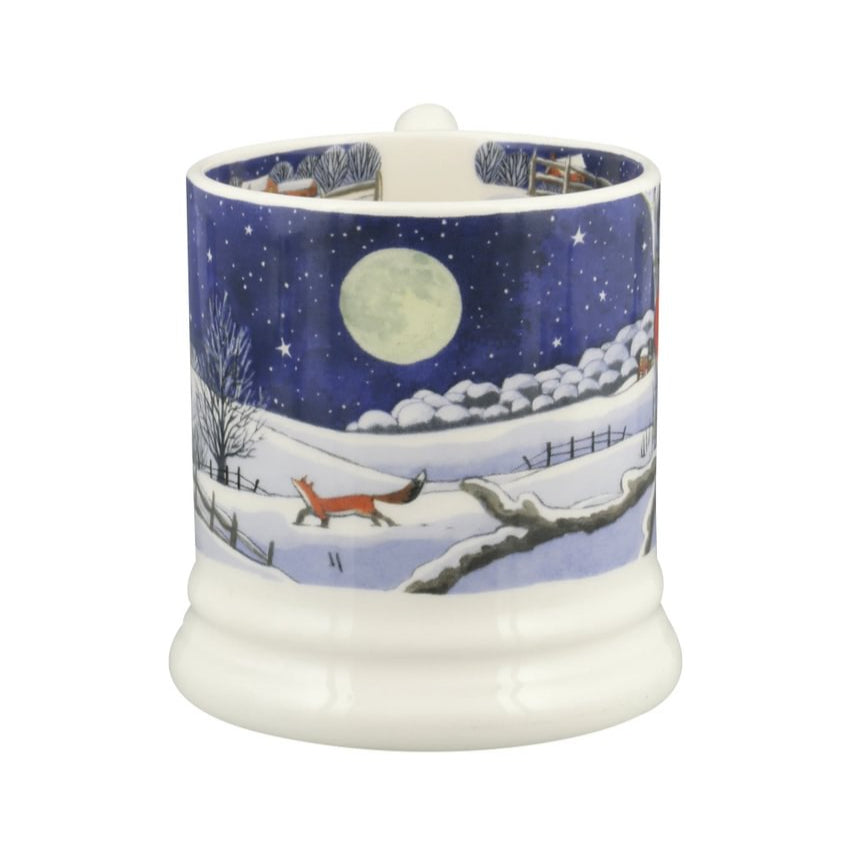 Ceramic mug with a winter scene design featuring a fox and moon on a white background