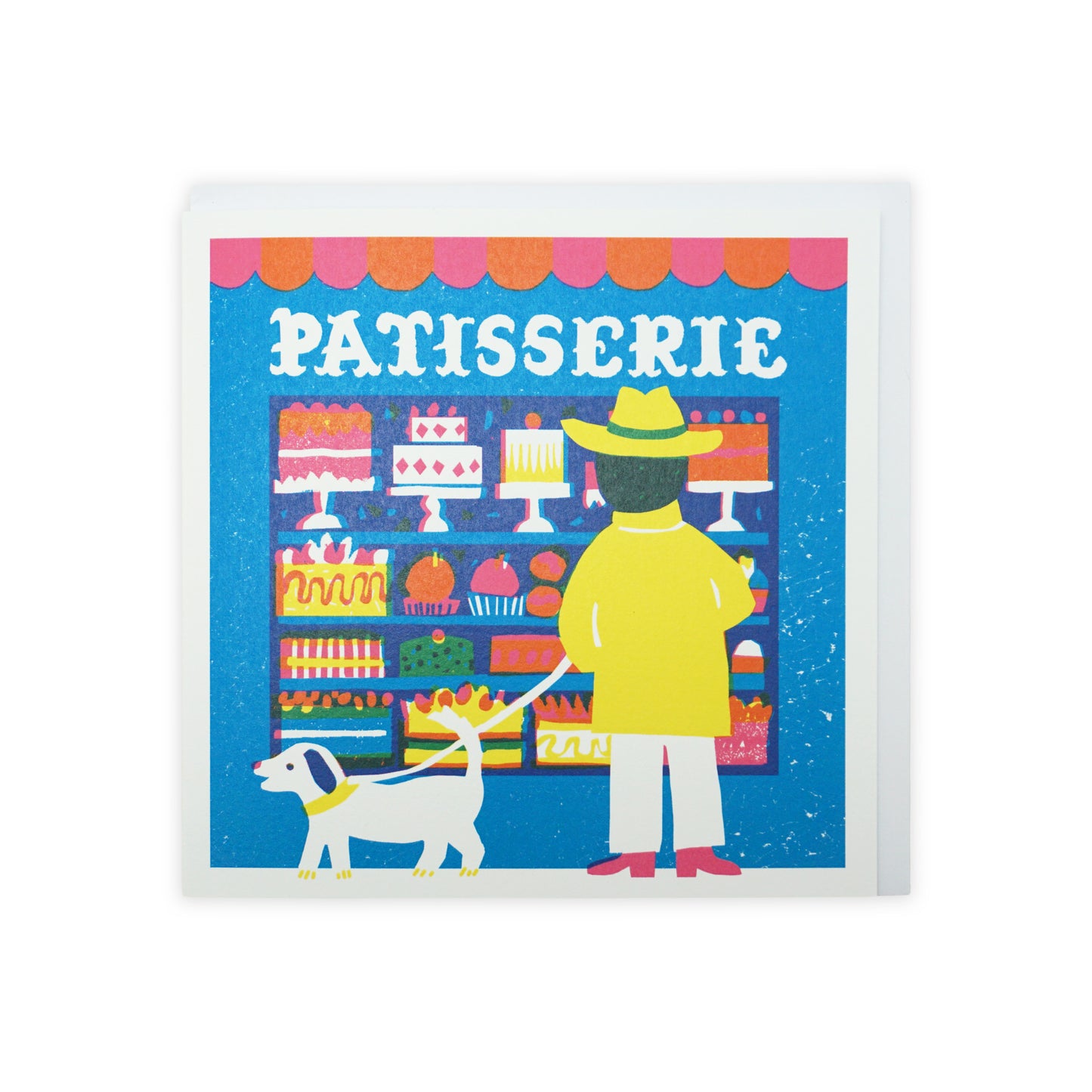 A colourful illustration of a patisserie shopfront, featuring a variety of cakes and pastries. A person in a yellow coat and hat stands beside a small dog, both gazing at the enticing display of sweets. The shop sign reads "PATISSERIE.