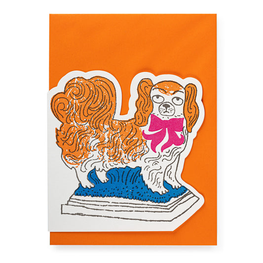 Illustration of a dog with a pink bow on an orange envelope