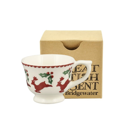 White mug with red and green reindeer design in a wooden box labelled 'Emma Bridgewater'.
