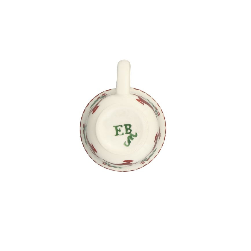 A white ceramic teacup viewed from below, featuring a delicate red pattern around the rim and a green monogram 'EB' in the centre.