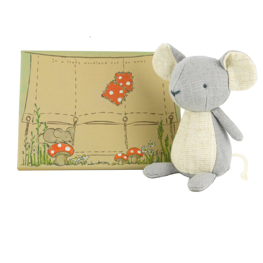 Plush mouse toy with a decorative box featuring mushroom illustrations on a white background