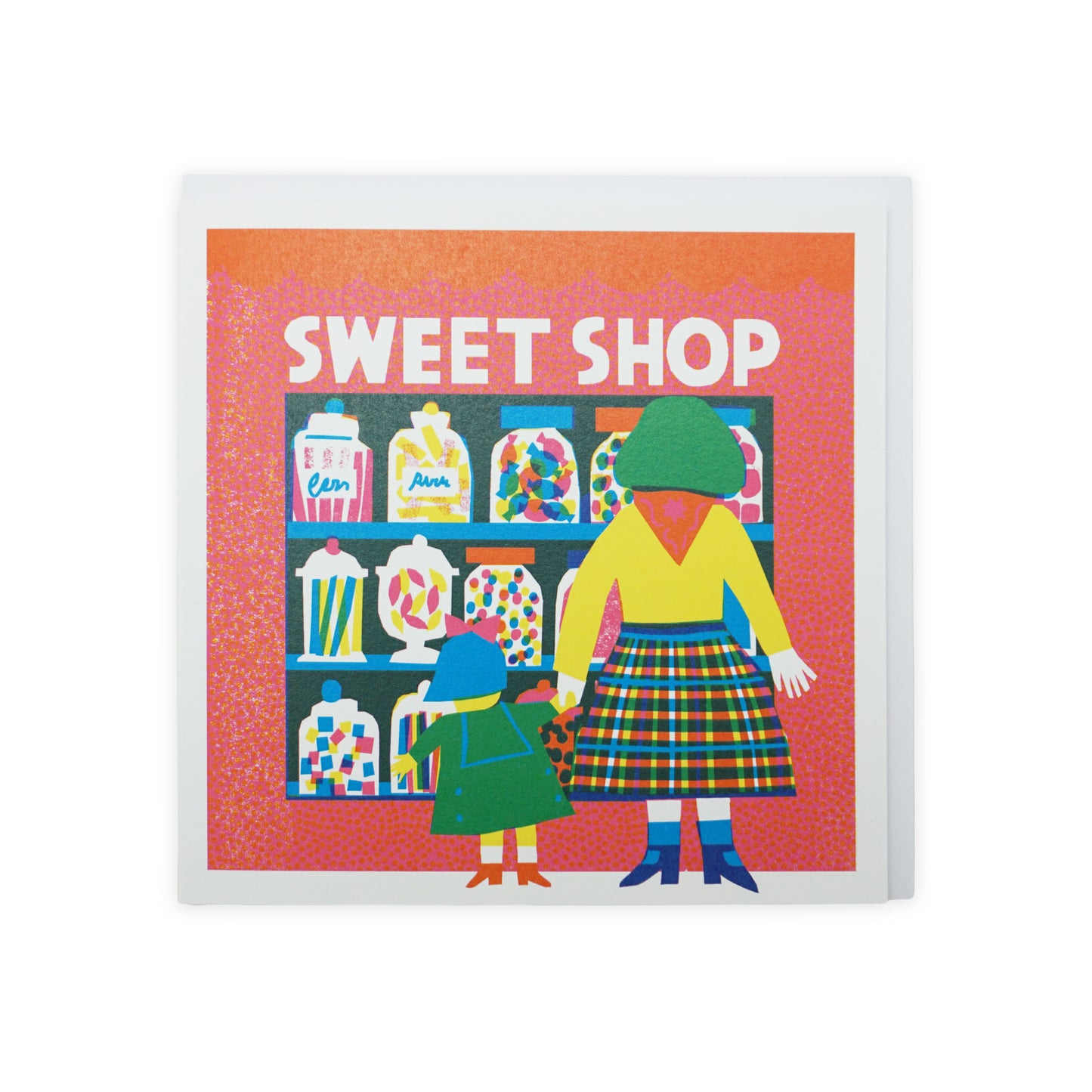 A vibrant illustration of a woman and a child standing in front of a sweet shop. The shop's window displays jars filled with colourful sweets. The woman wears a bright yellow top and a plaid skirt, while the child is dressed in green.