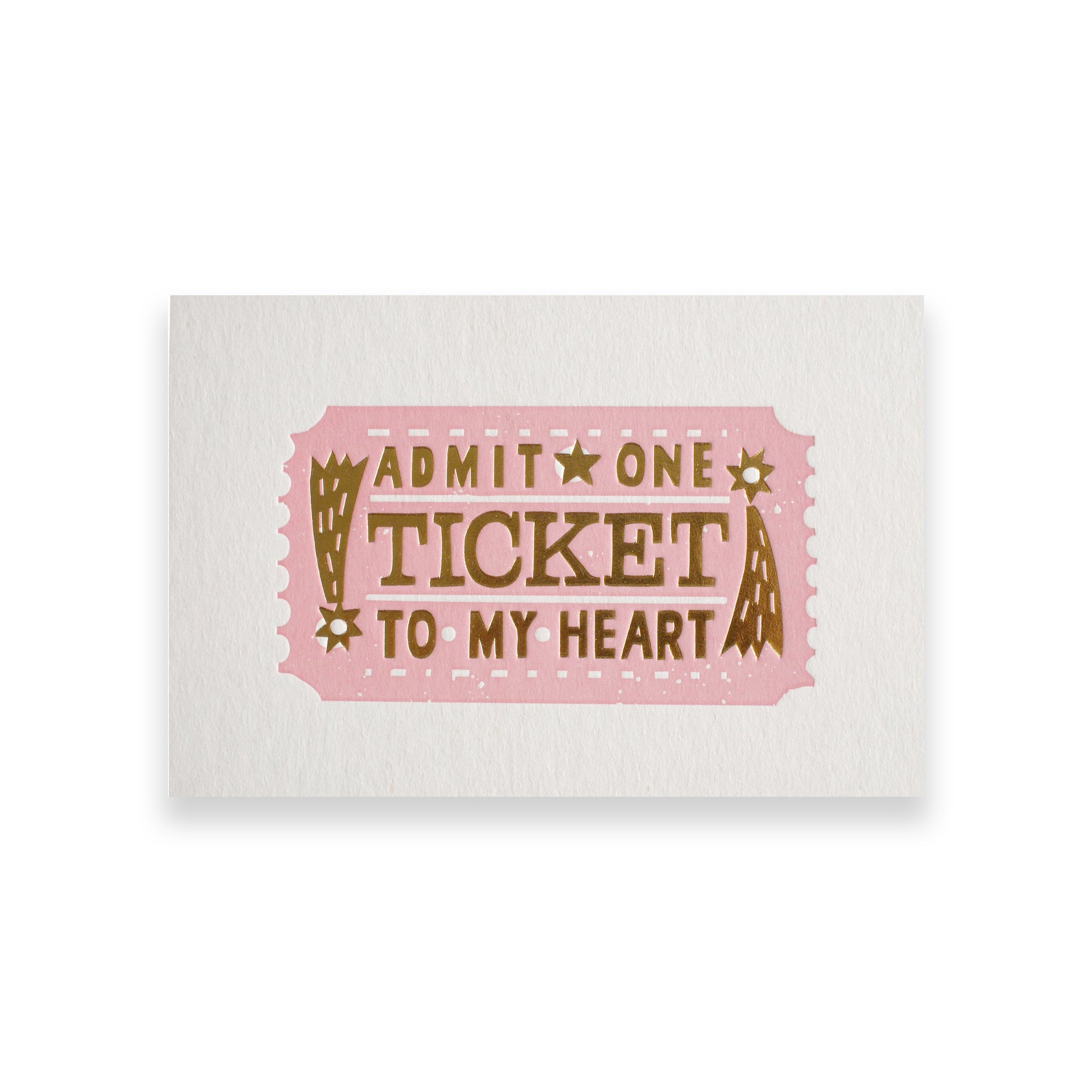 A pink ticket design featuring the text "Admit One Ticket to My Heart" in bold, decorative lettering. The ticket has a vintage style with stars and decorative elements, set against a textured white background.