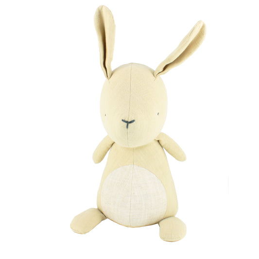 Cream plush bunny toy with long floppy ears on a white background