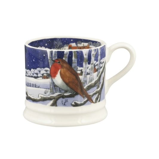 Mug with a winter scene featuring a robin on a blue background