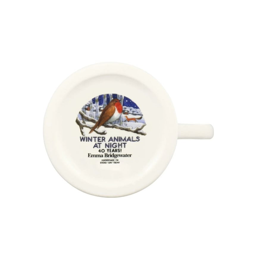 White mug with a bird design and text on a white background