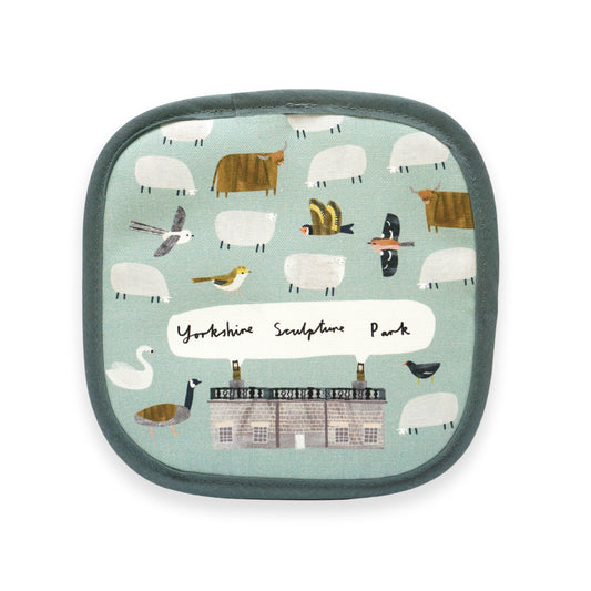 A square fabric pot holder featuring a whimsical illustration of various animals, including sheep, birds, and a cow, set against a light blue background. At the bottom, the text reads "Yorkshire Sculpture Park" in a playful font.