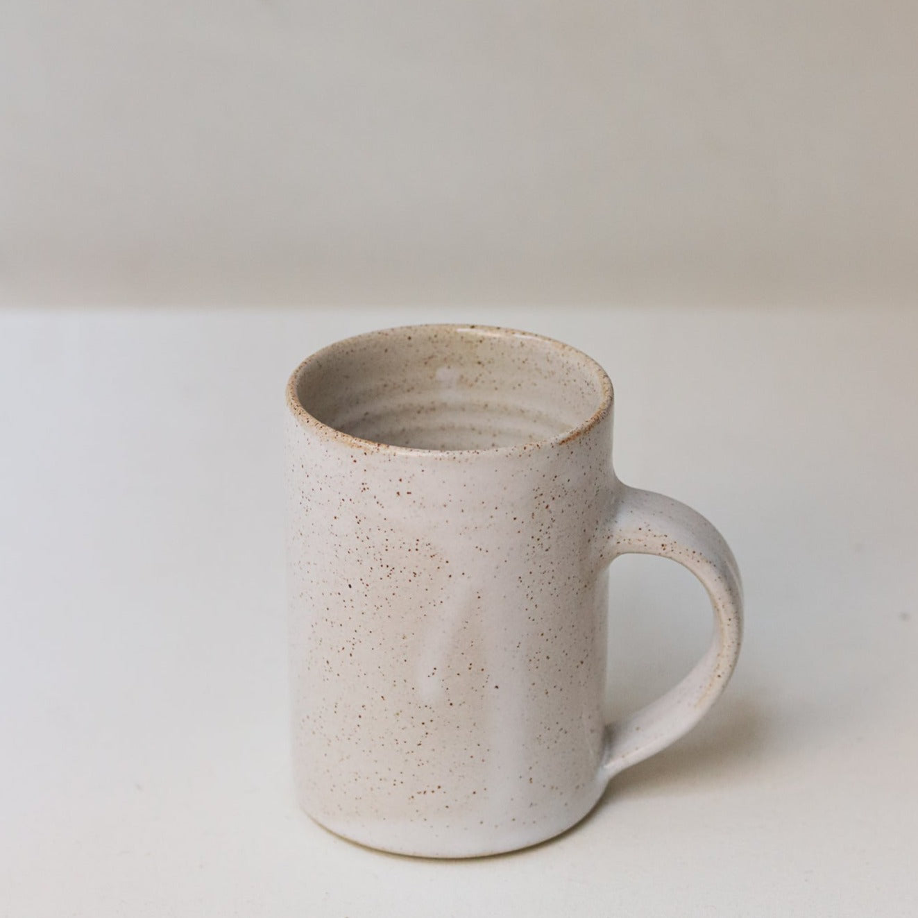 Pottery West: Speckled White Mug