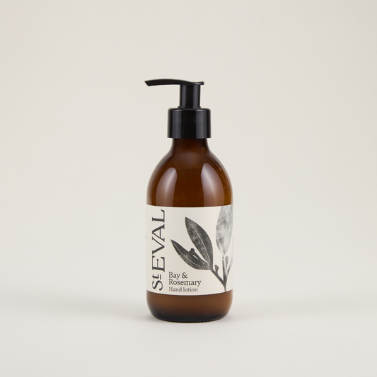 Brown bottle with pump and white label on a beige background