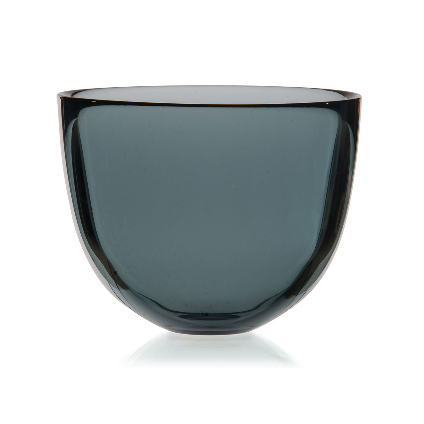 A smooth, rounded glass bowl in a dark, smoky grey hue. The bowl has a glossy finish and a slightly flared rim, resting on a flat base. The transparent quality allows light to pass through, creating subtle reflections.